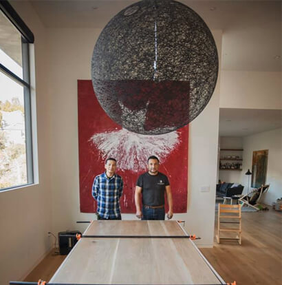 Jose Cruz - Cruz Custom Cabinets jose cruz with employee with custom wood table he created